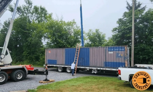 Container on a trailer lifted by Crane.
