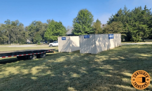 Loading two Containers on a trailer for transport.