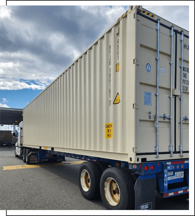 Transporting a container by semi truck.