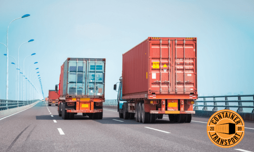 Containers being transported on a trailer.