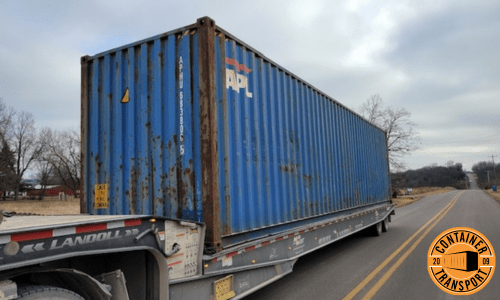 Container transported on a trailer.