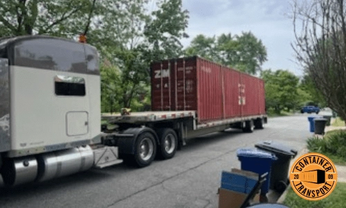 Transporting a 40 Foot Loaded Container on a Step deck trailer.