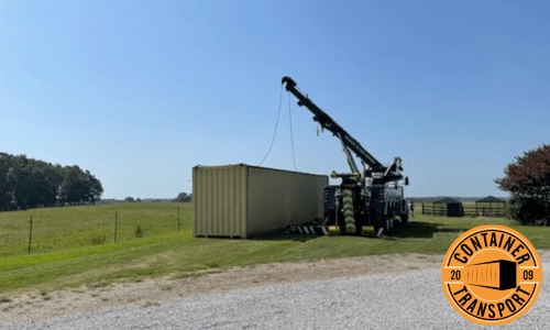 Crane lifting a 40ft HC container.