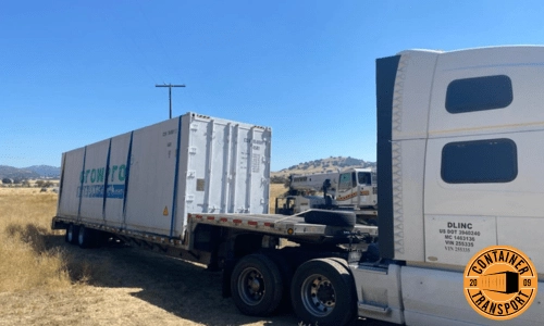 Transporting a 40ft HC container filled with equipment.