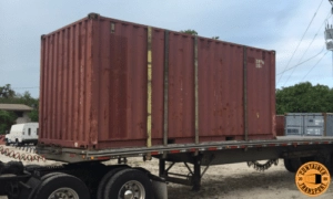 Transporting a Container on a Flatbed trailer.