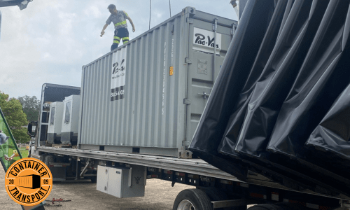 Container being shipped on a Conestoga Trailer.