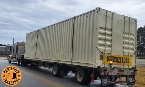 Oversized container being transported.