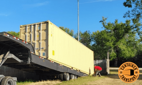 Container getting loaded onto a trailer.