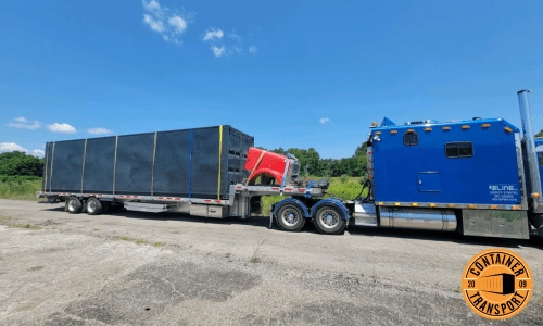 Container on a Step Deck Trailer.