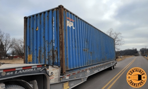 Container transported on a trailer.