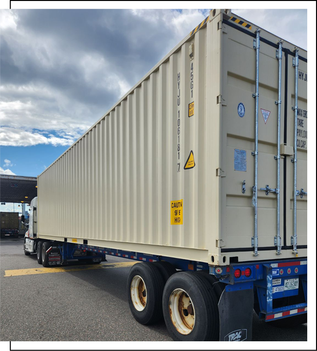 Transporting a container by semi truck.