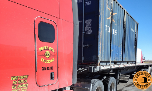 Shipping a container on a trailer.
