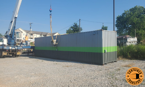 Using Crane to lift Container.