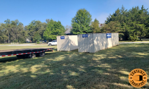 Loading two Containers on a trailer for transport.