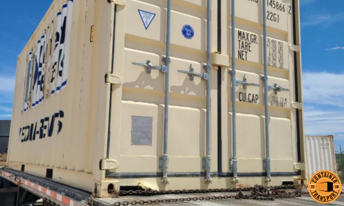 Shipping a Container strapped on a trailer.