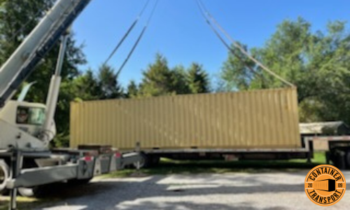 Crane loading Container onto trailer.