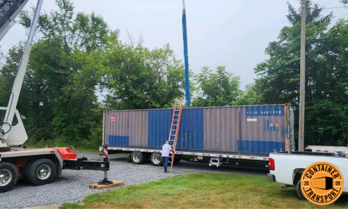 Container on a trailer lifted by Crane