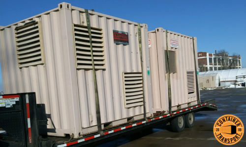 Shipping a Container strapped onto a trailer.