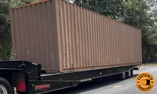 Container on a RGN trailer.