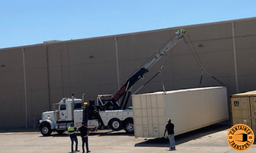 Crane lifting container.